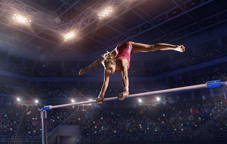 Person on the gymnastics uneven bars