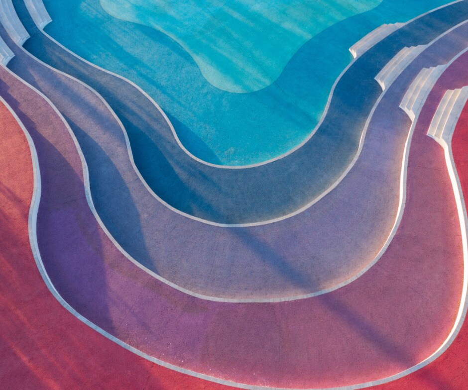 layers of waves inside swimming pool in different colors