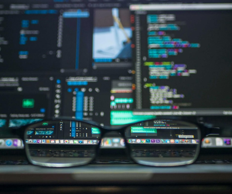 glasses infront of computer