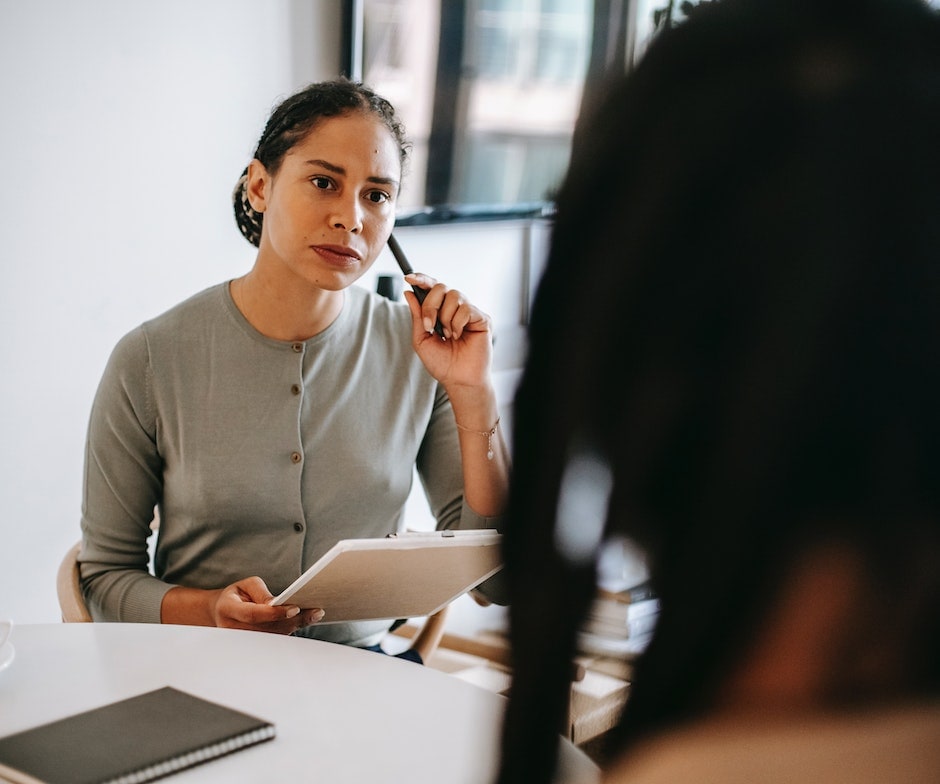 healthcare counselor talking to patience