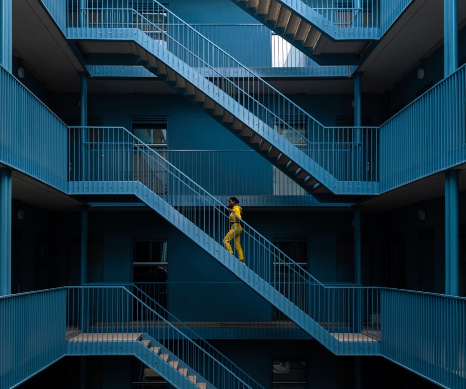 man walking up the stairs