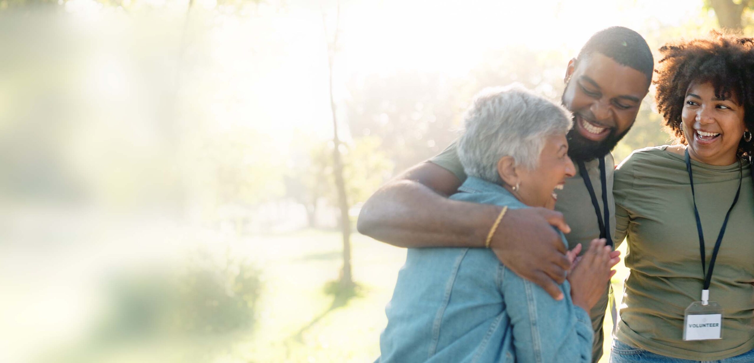 volunteers hugging one another