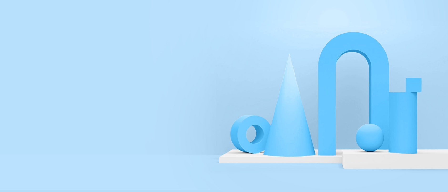 blue 3D shapes sitting on white platform with blue background